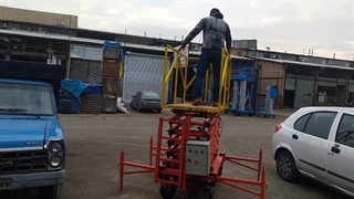 بالابر آکاردئونی متحرک با چرخ کارگاهی